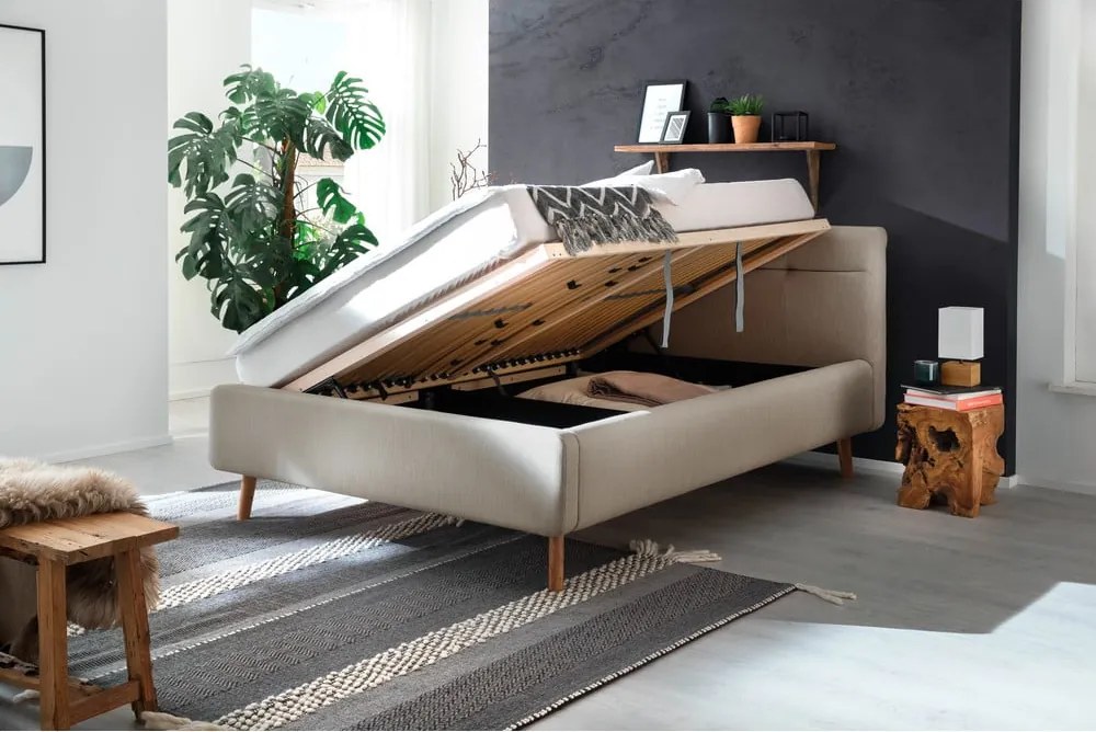 Bézs kárpitozott ágyneműtartós franciaágy ágyráccsal 140x200 cm Lotte – Meise Möbel