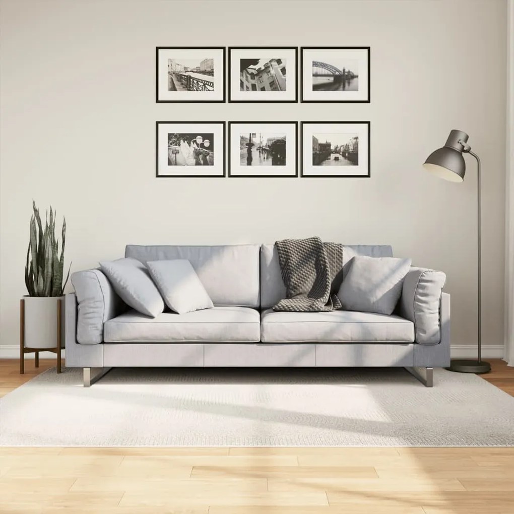 IZA krémszínű rövid szálú skandináv stílusú szőnyeg 140x200 cm