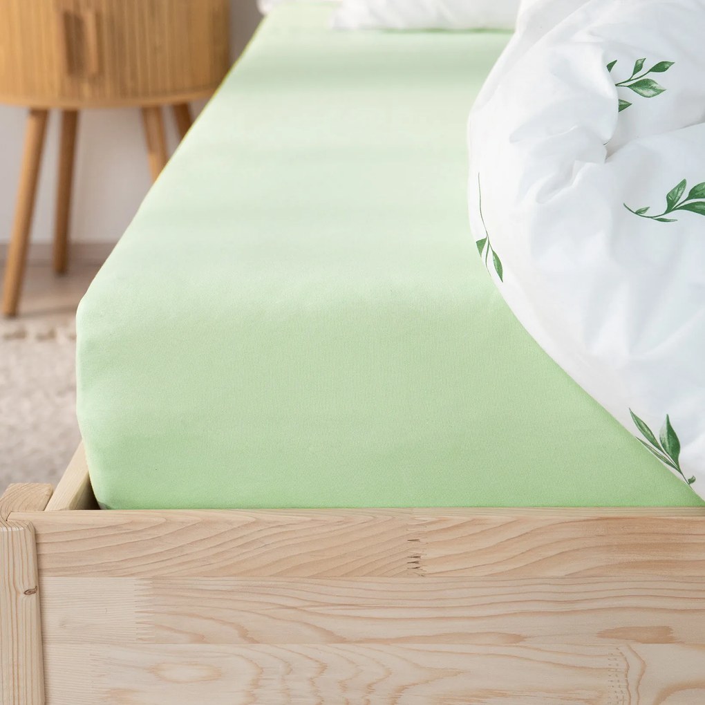Goldea jersey gumis lepedő - világoszöld 180 x 200 cm