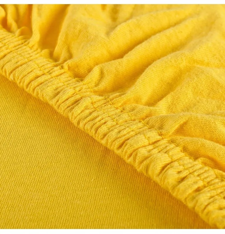 EMI sárga 100% pamutjersey gumis lepedő, 90x200-as lap