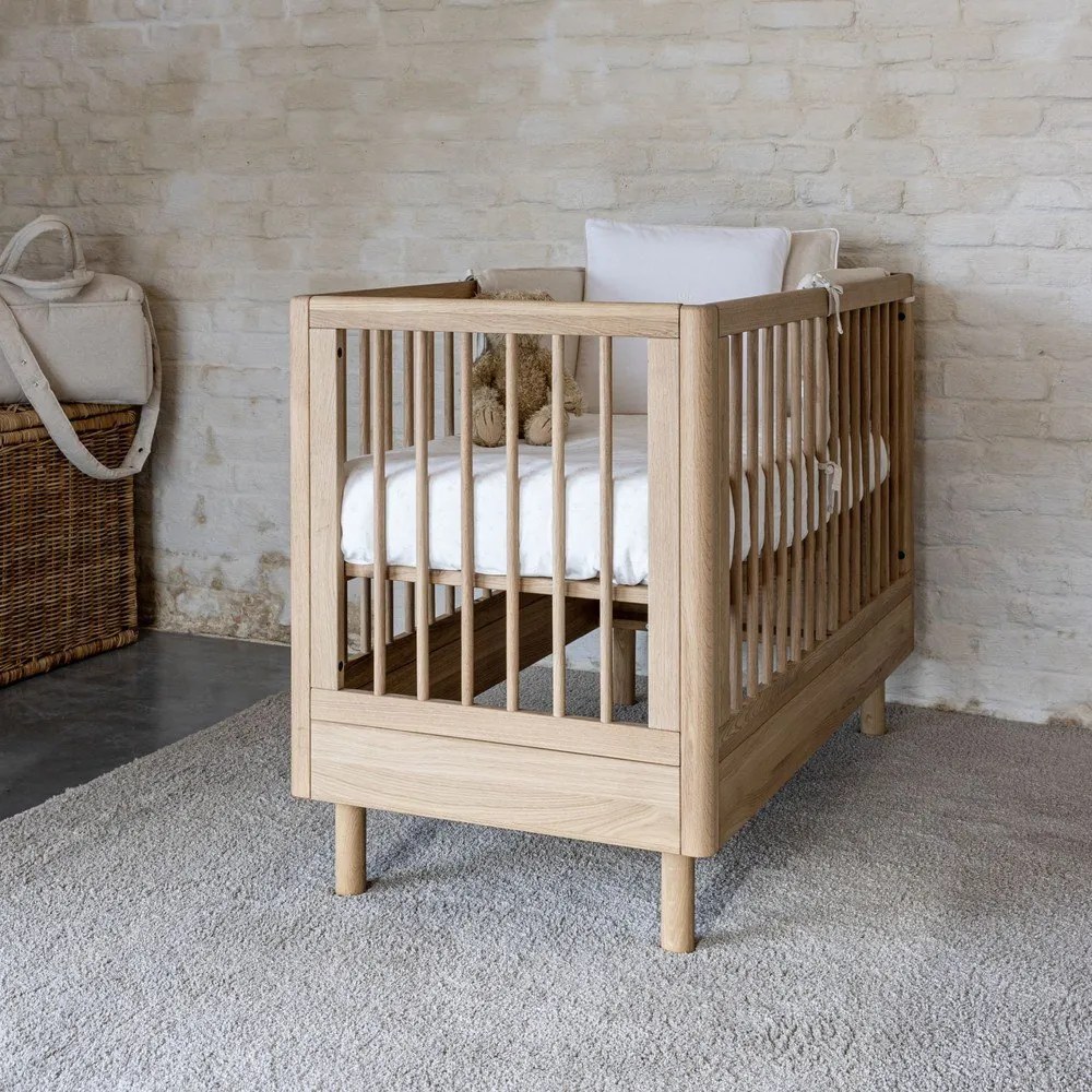 Natúr színű tölgyfa babaágy állítható magassággal 60x120 cm Forrest – Vipack