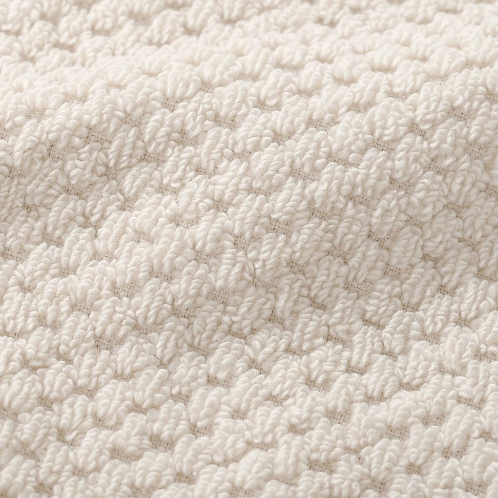Goldea pamut frotír törölköző / fürdőlepedő micro pure - mandulaszín 70 x 140 cm