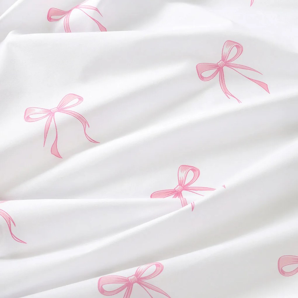 Goldea pamut körgumis lepedő - rózsaszín masnik 120 x 200 cm