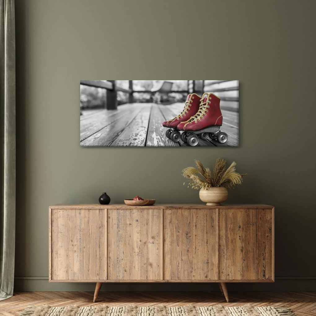 Egy piros régi görgős cipő képe (120x50 cm)