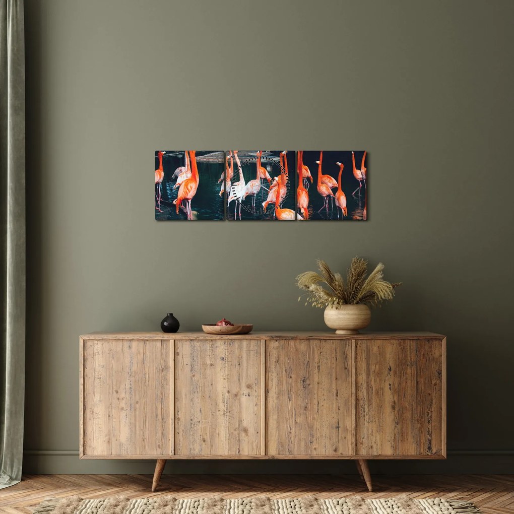 Vászonkép - Flamingók csordája (órával) (90x30 cm)
