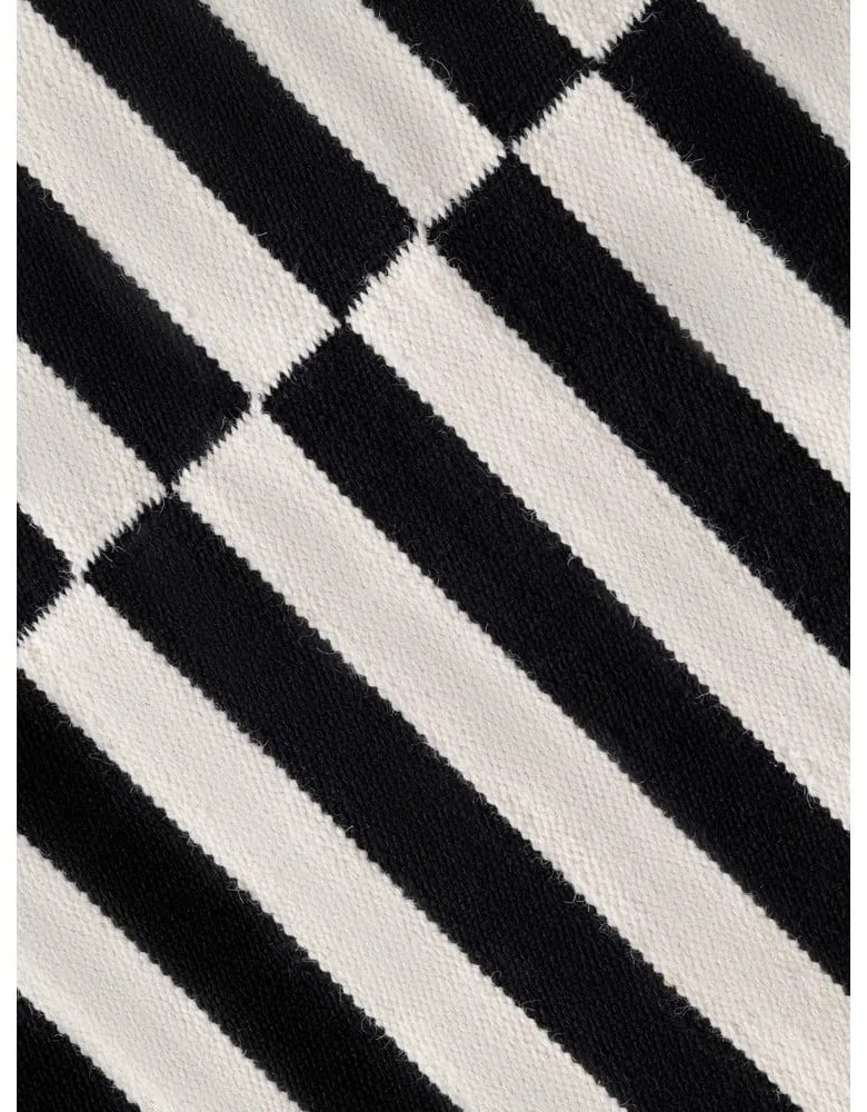 Fekete-fehér kétoldalas kézi szövésű gyapjú szőnyeg 120x180 cm Donna – Hanse Home