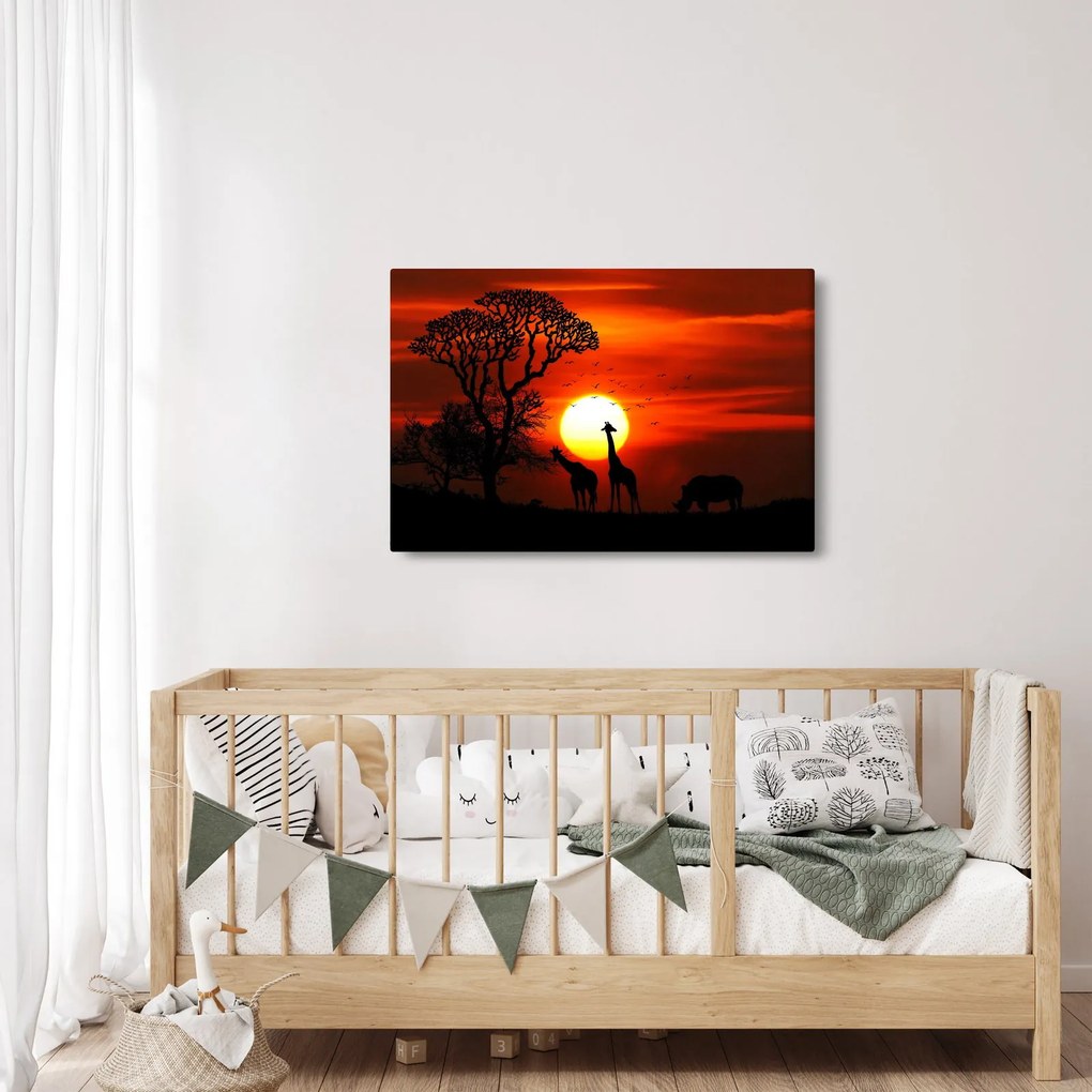 Kép - Állatok sziluettjei napnyugtakor (90x60 cm)