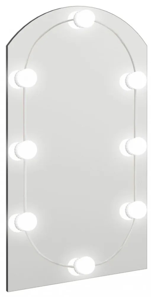 ívelt üvegtükör LED-lámpákkal 70 x 40 cm