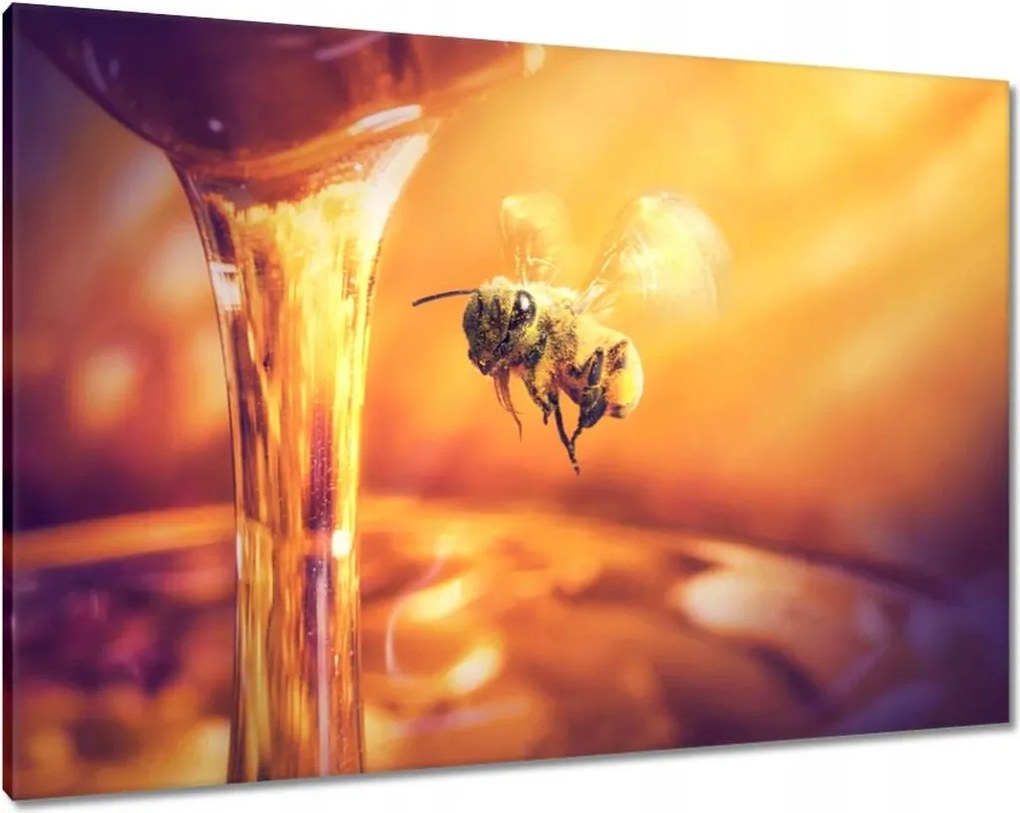Vászonkép 100x70 Csöpögő méz egy befőttesüvegből