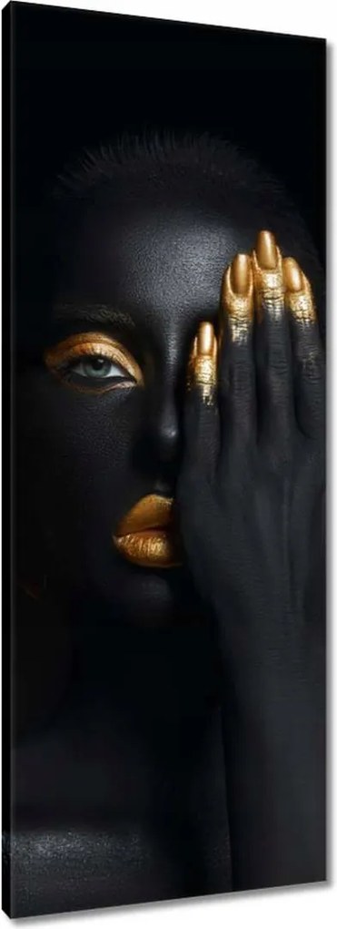 Vászonkép 40x100 Arc az arany tenyér alatt