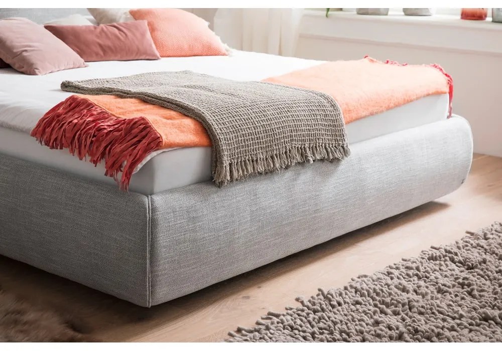 Szürke kárpitozott ágyneműtartós franciaágy ágyráccsal 180x200 cm Atesio – Meise Möbel