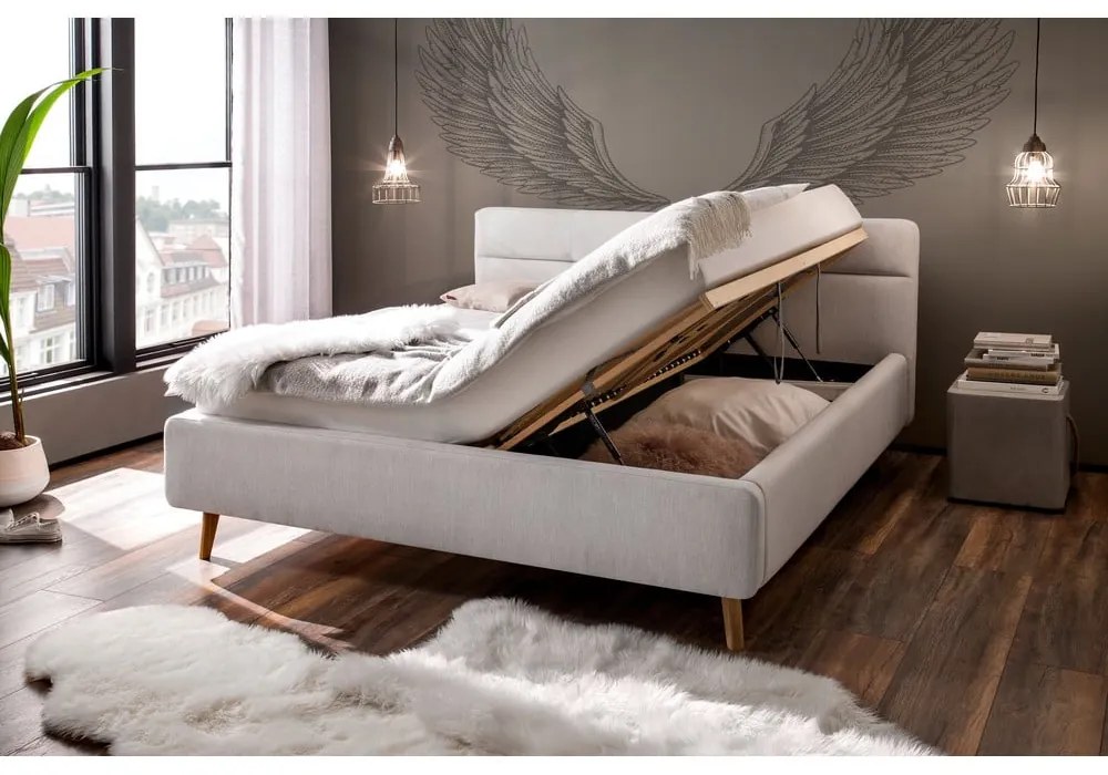 Világosszürke kárpitozott ágyneműtartós franciaágy ágyráccsal 160x200 cm Lotte – Meise Möbel