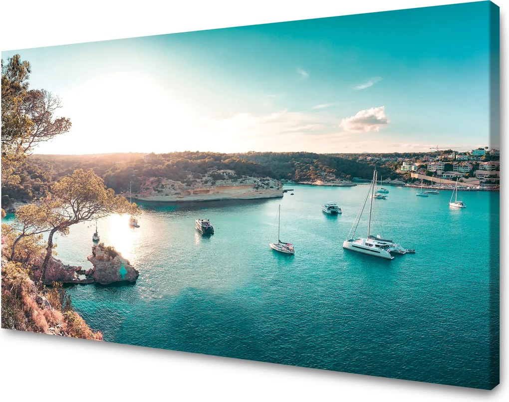 Vászonkép Víz a nap tükrében Csónakok Sziklák 120x70 cm