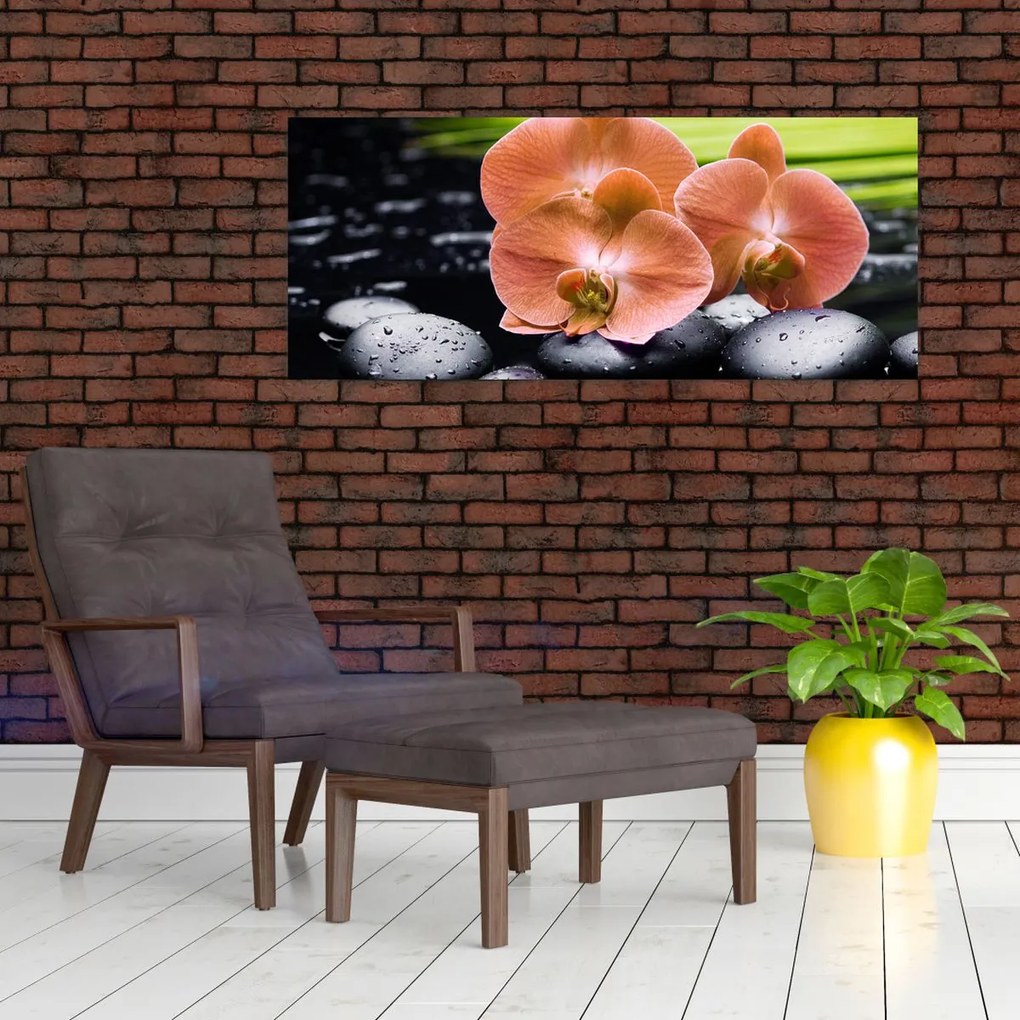 Kép - Narancssárga orchidea pálmalevelekkel (120x50 cm)