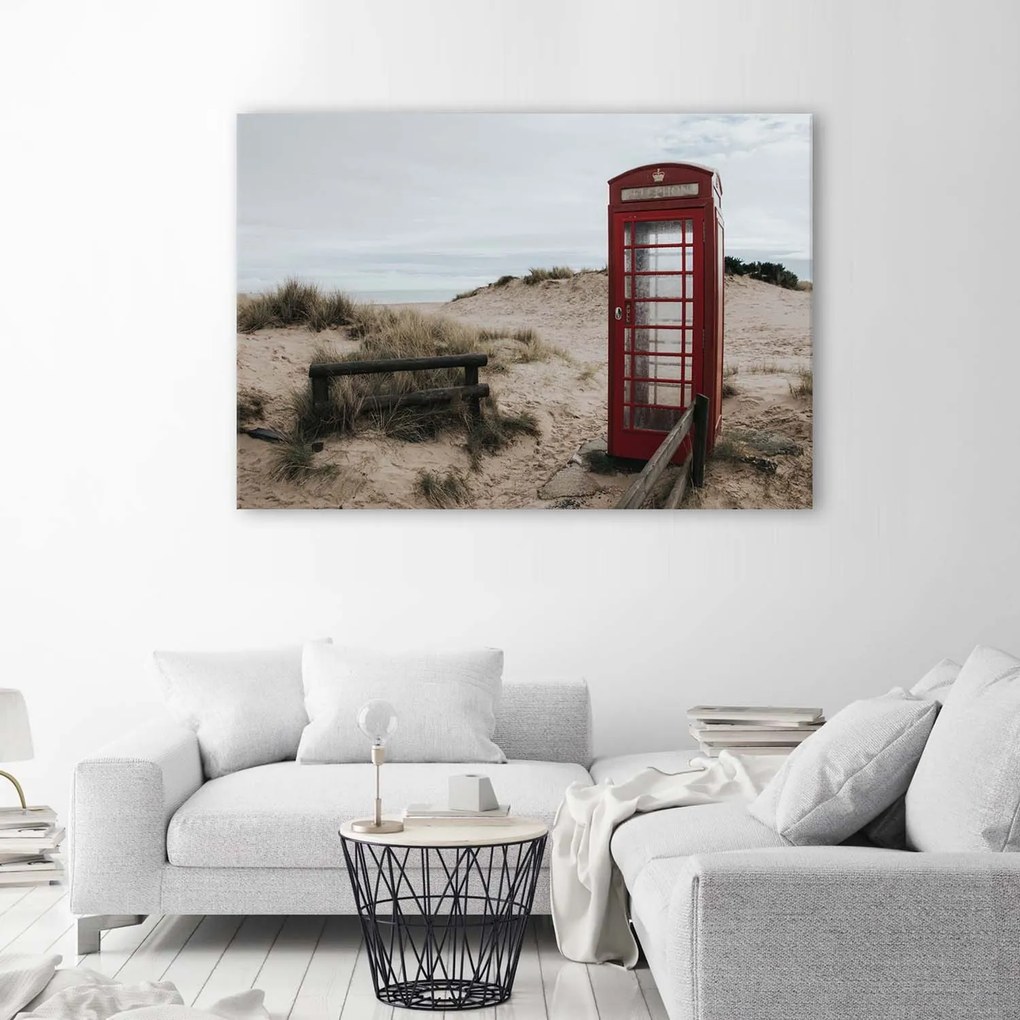 Gario Vászonkép Telefonfülke a tengerparton Méret: 100 x 70 cm