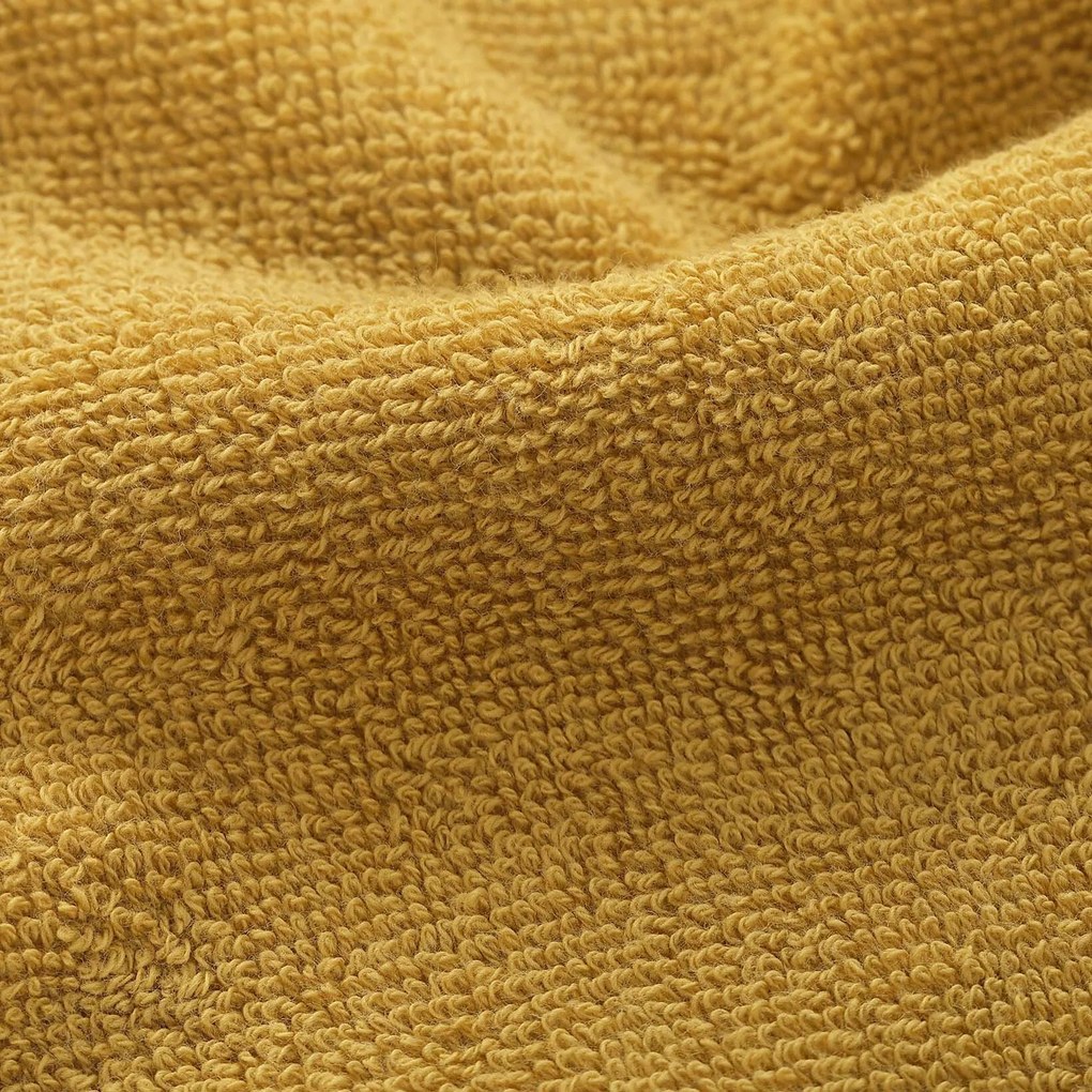 Goldea bordűr nélküli frottír törölköző és fürdőlepedő soft – mustárszínű 30 x 50 cm