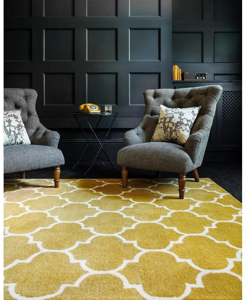 Okkersárga kézi szövésű gyapjú szőnyeg 120x170 cm Albany – Asiatic Carpets