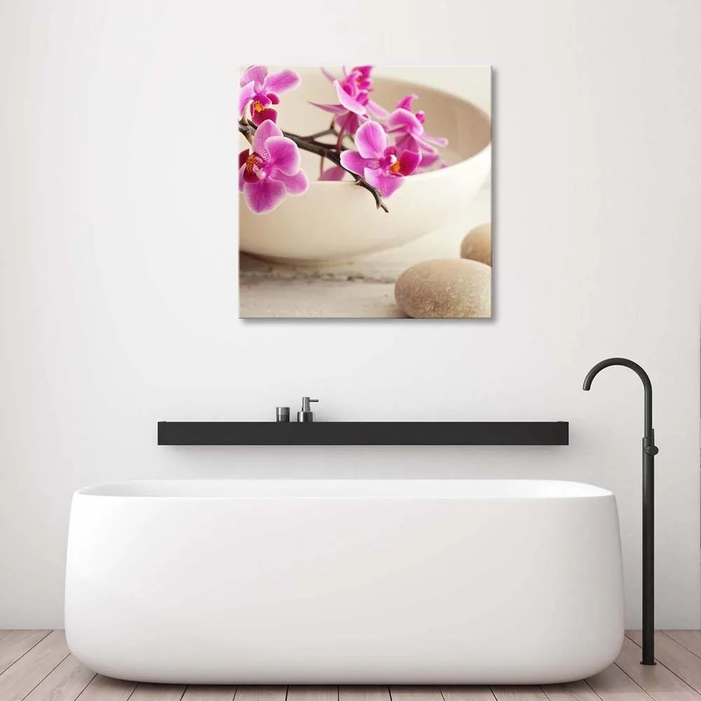 Gario Vászonkép Rózsaszín orchideák egy tálban Méret: 50 x 50 cm