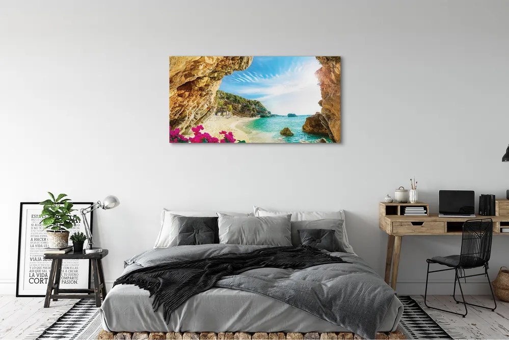 Canvas képek Görögország parti sziklák virágok 125x50 cm