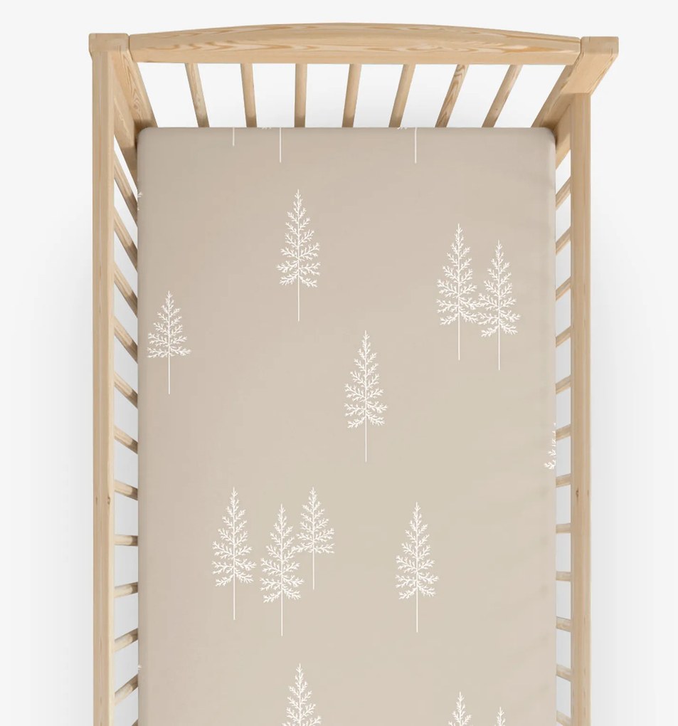 Goldea karácsonyi gyermek gumis pamut lepedő kiságyba - északi fenyők 60 x 120 cm