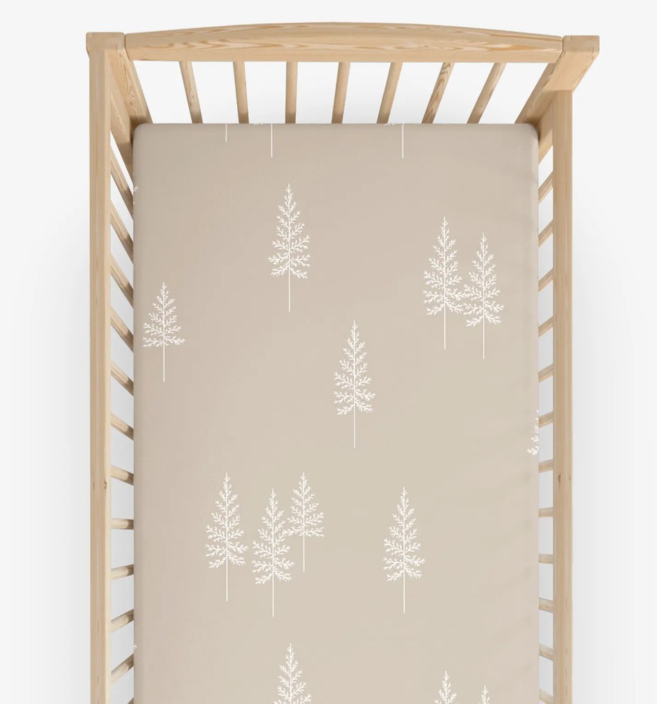 Goldea karácsonyi gyermek körgumis pamut lepedő kiságyba - északi fenyők 60 x 120 cm