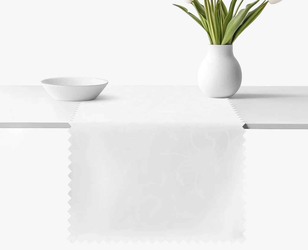 Goldea ünnepi viaszosvászon asztali futó - fehér nagy ornamentekkel ékesített 35x120 cm