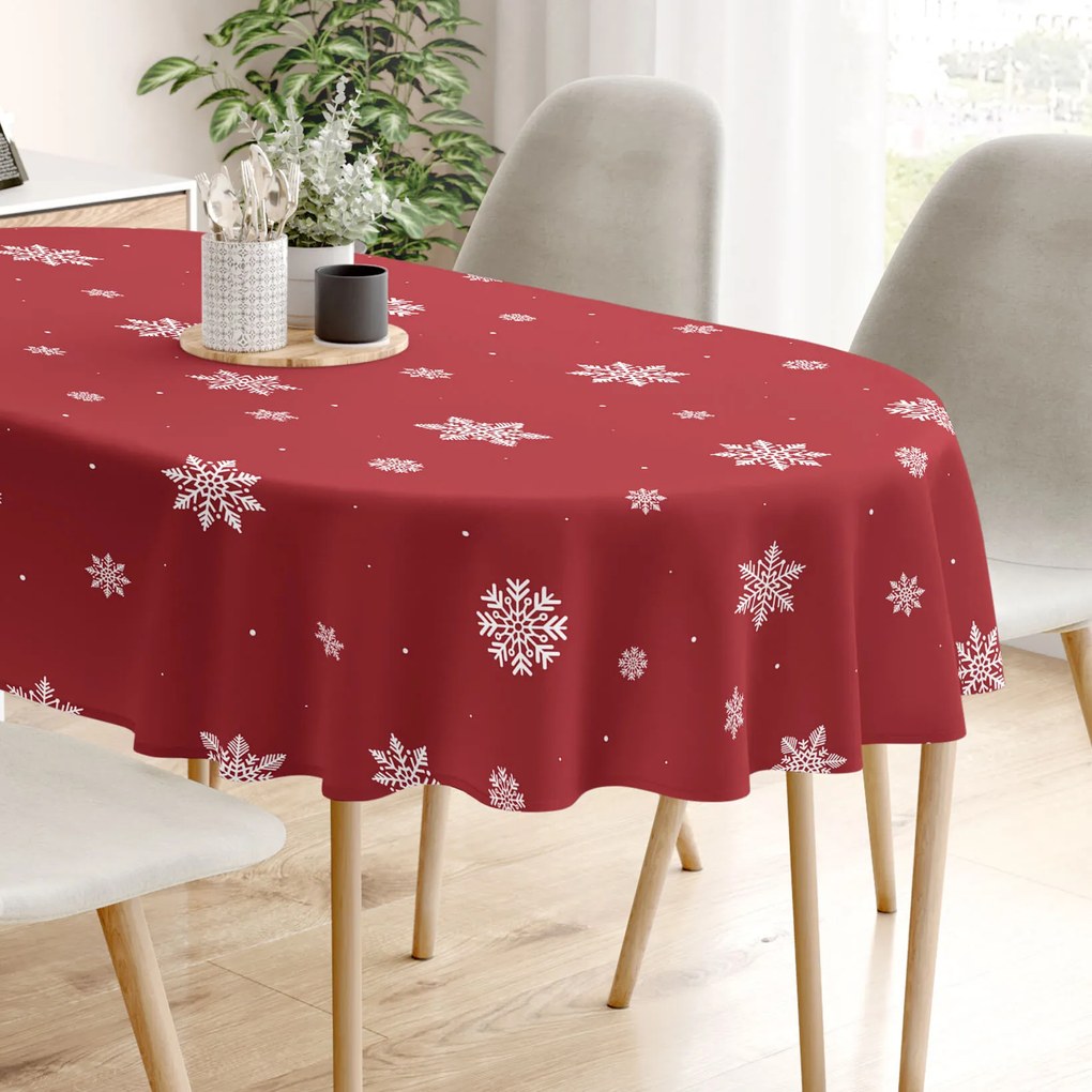 Goldea ovális pamut terítő - hópelyhek piros alapon 140 x 180 cm