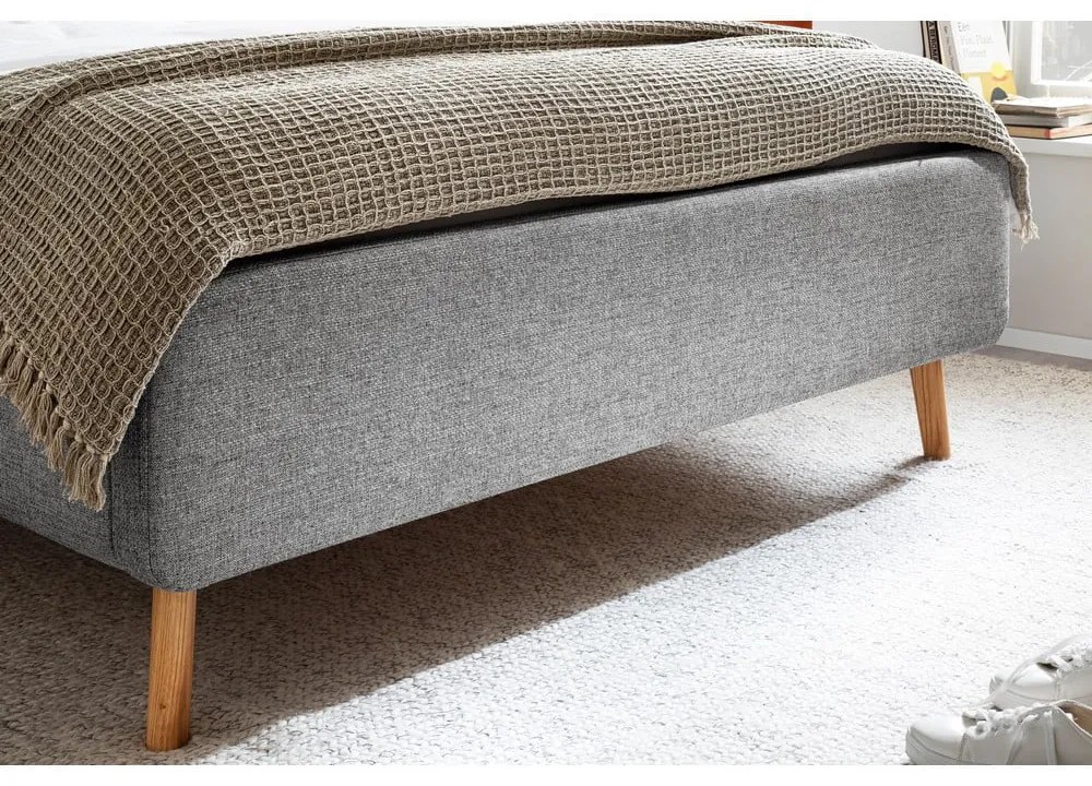 Szürke kárpitozott ágyneműtartós franciaágy ágyráccsal 180x200 cm Lotte – Meise Möbel