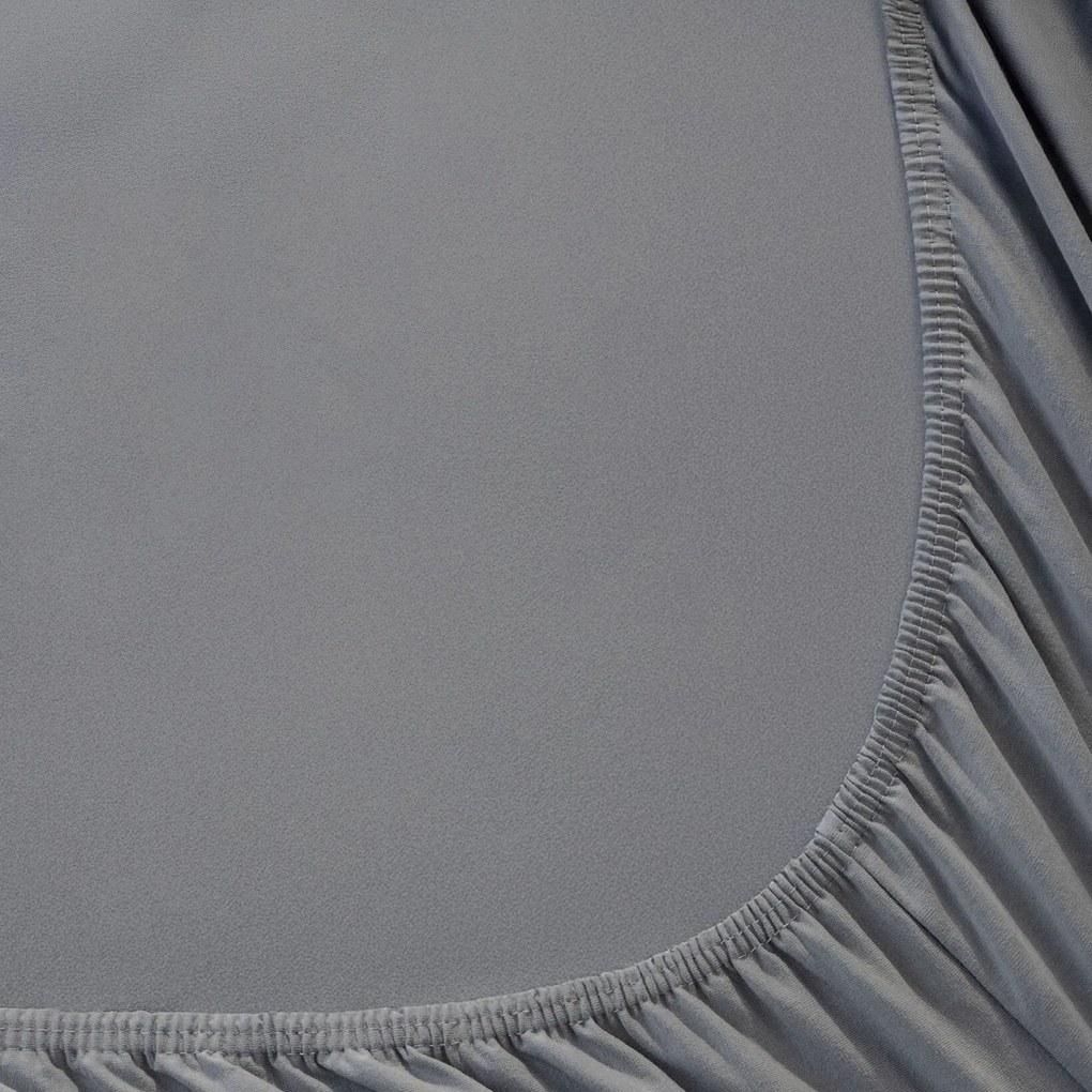 Goldea jersey gumis lepedő - sötétszürke 140 x 200 cm