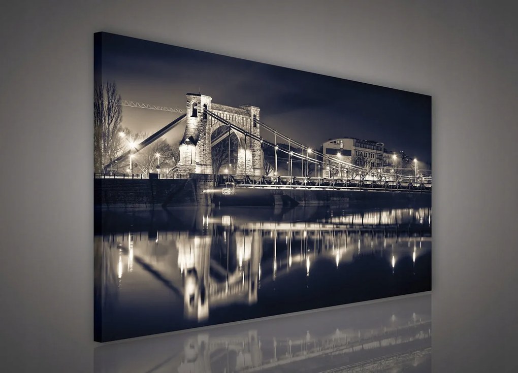 Vászonkép 100x75 Éjszakai város híd folyó tükröződés építészet városkép