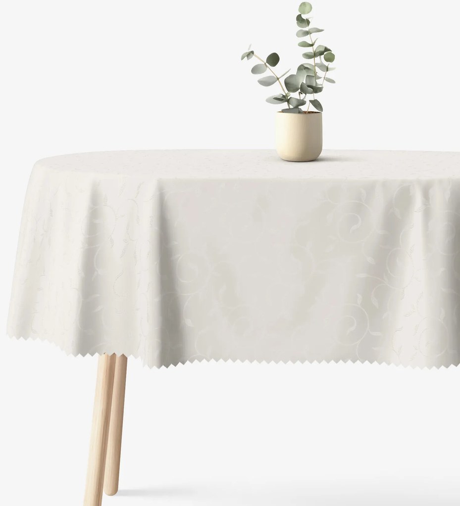 Goldea ünnepi ovális teflonos terítő - tej színű nagy ornamentekkel ékesített 140 x 220 cm