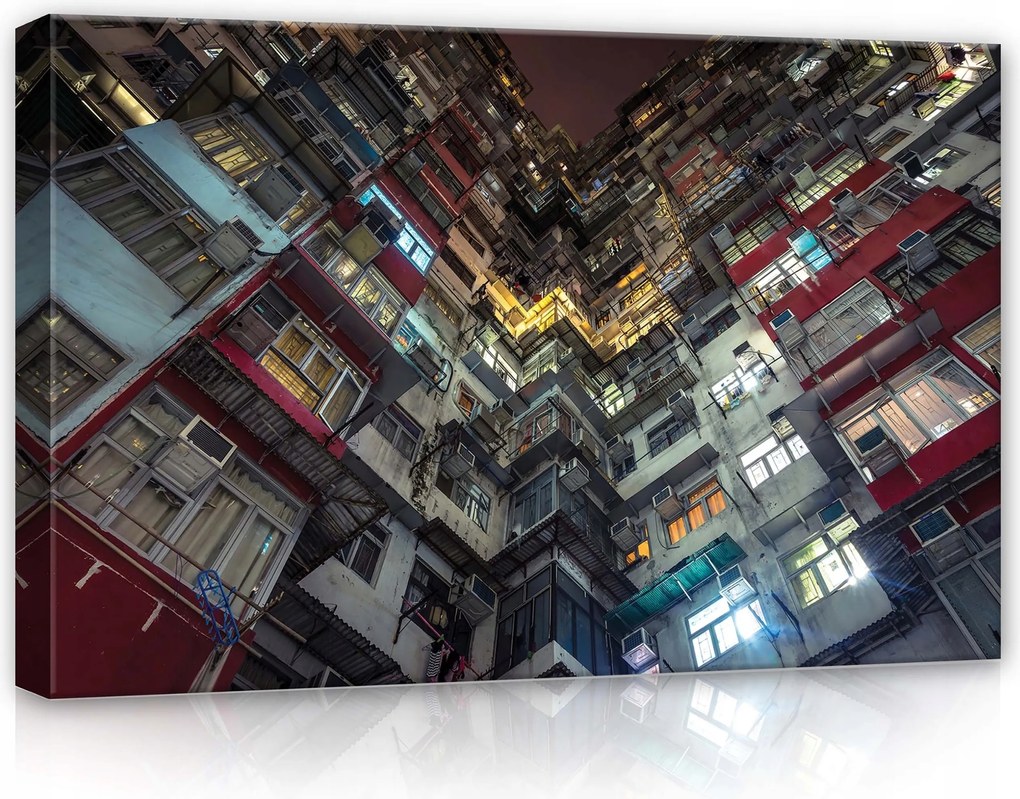 Vászonkép 60x40 Városi sűrűség épület magasság udvar ablak fény éjszaka