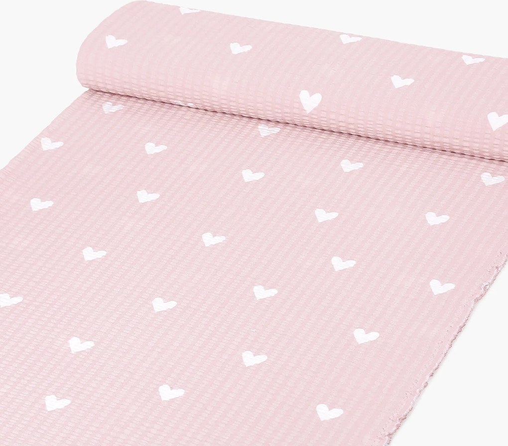 Goldea pamut krepp anyag - szívecskék, púderrózsaszín alapon 160 cm
