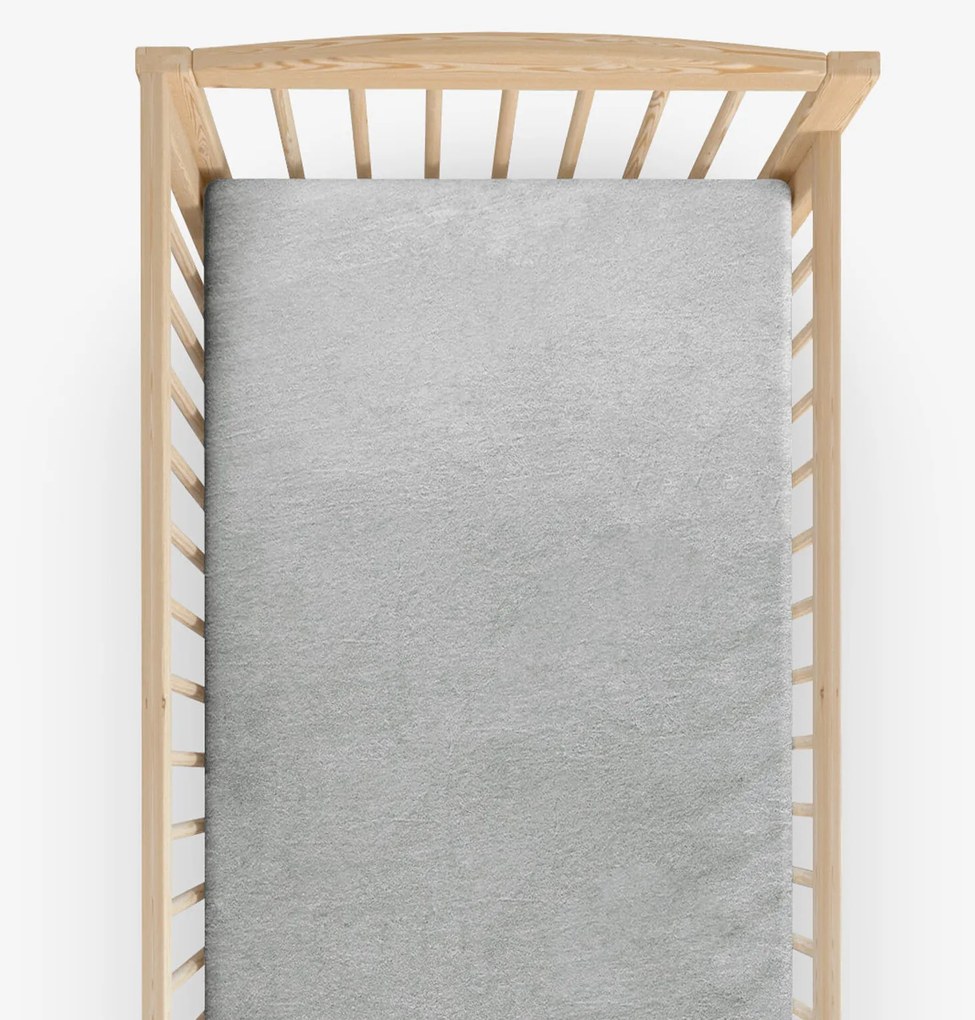 Goldea nem áteresztő frottír lepedő kiságyba - világosszürke 60 x 120 cm