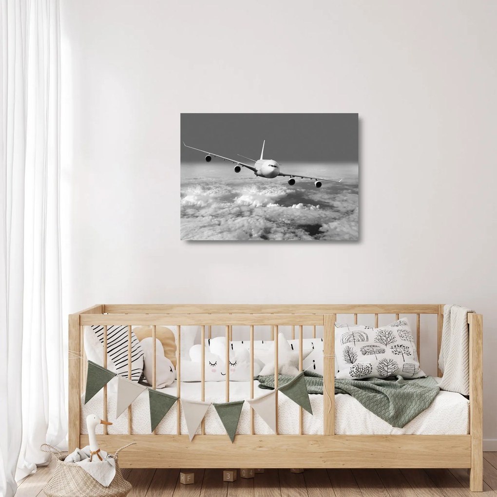 Üveg kép - Repülőgép a felhőkben, fekete-fehér (70x50 cm)