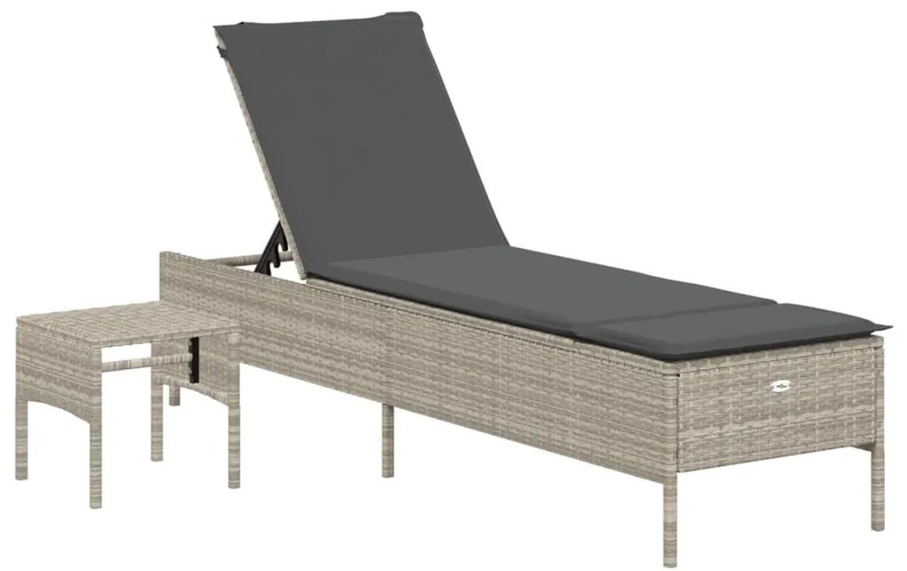 világosszürke polyrattan napozóágy asztallal és párnával