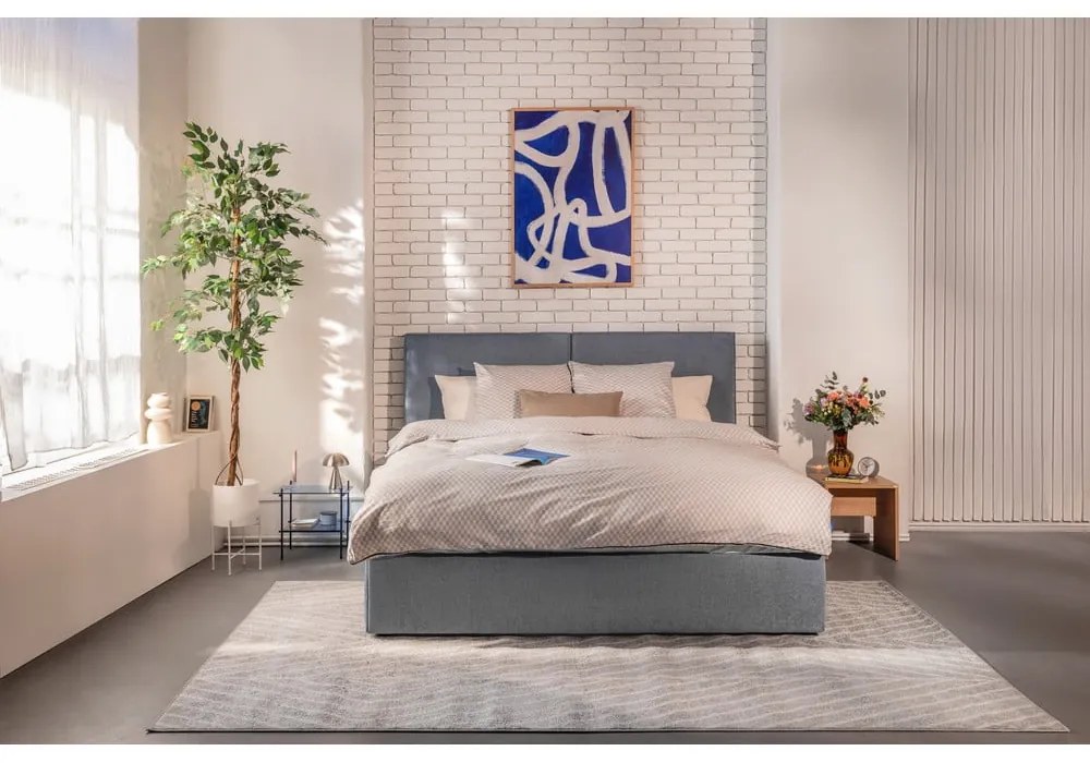 Kék kárpitozott ágyneműtartós franciaágy ágyráccsal 180x200 cm Thessa Bold – Bonami Selection