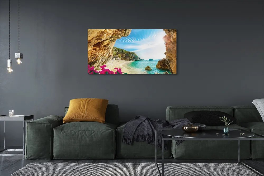 Canvas képek Görögország parti sziklák virágok 125x50 cm