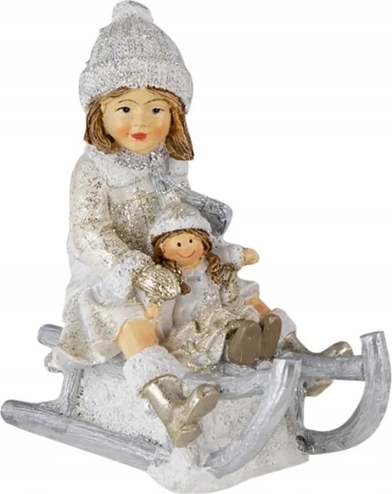 Karácsonyi dekorációs figura kislány szánon babával 10x5x10 cm