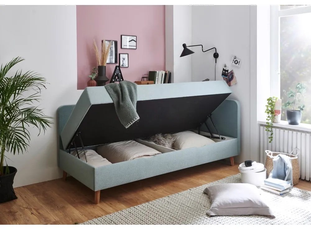 Világoskék kárpitozott egyszemélyes ágy tárolóhellyel 120x200 cm Cabana – Meise Möbel