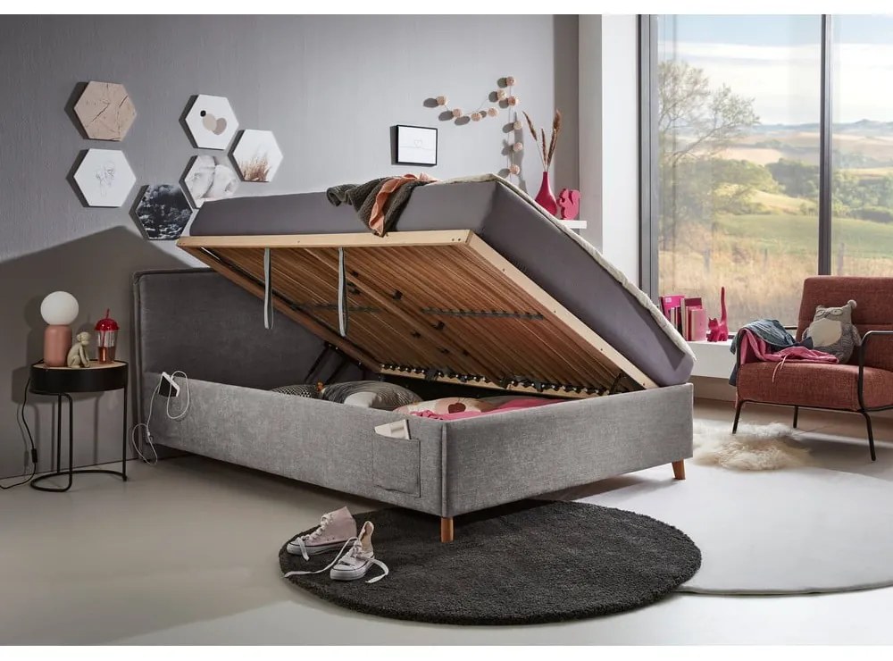 Szürke kárpitozott ágyneműtartós gyerekágy ágyráccsal 90x200 cm Fun – Meise Möbel