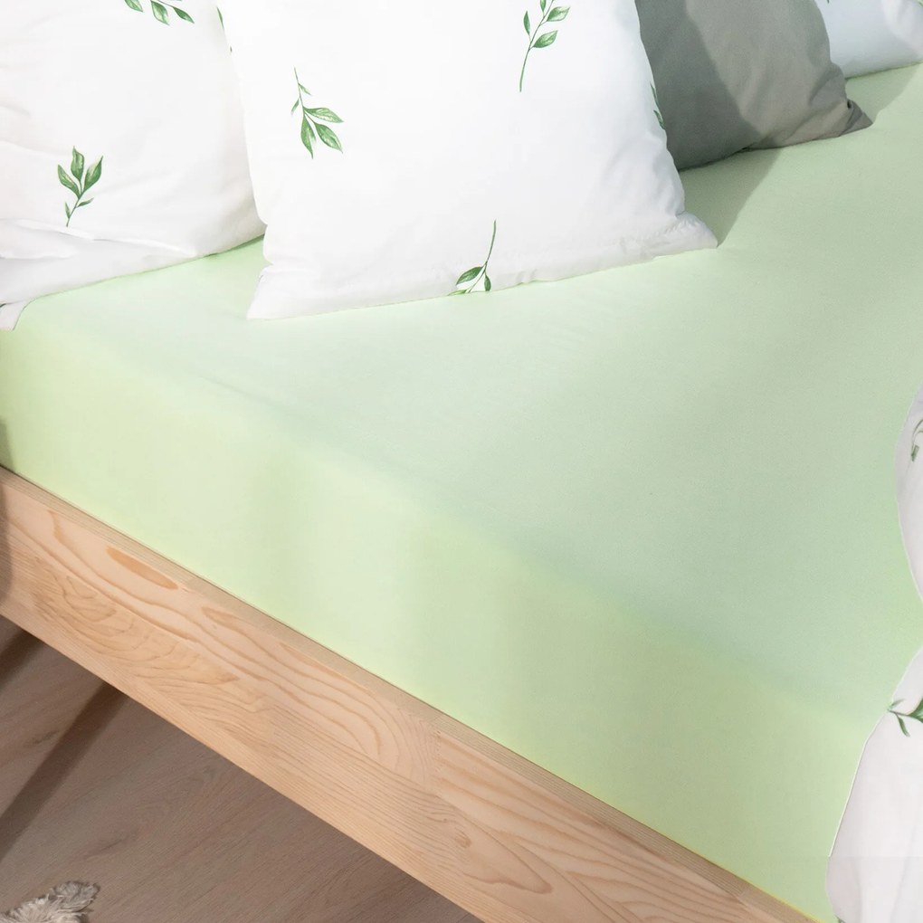 Goldea jersey gumis lepedő - világoszöld 160 x 200 cm