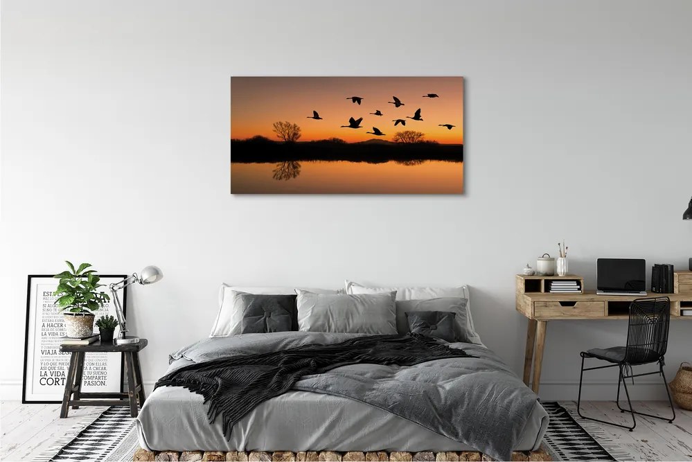 Canvas képek Repülő madarak naplemente 120x60 cm