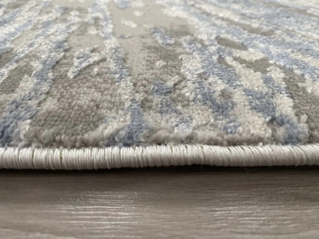 Veston 51262 kék modern szőnyeg 60x110 cm