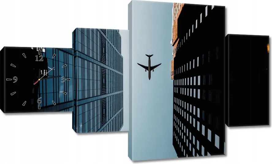 Faliórák 130x80 Repülőgép az épületek között