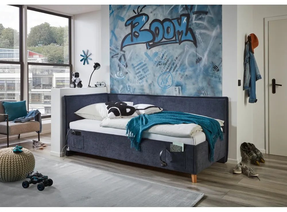 Sötétkék kárpitozott ágyneműtartós sarok gyerekágy ágyráccsal 140x200 cm Fun – Meise Möbel