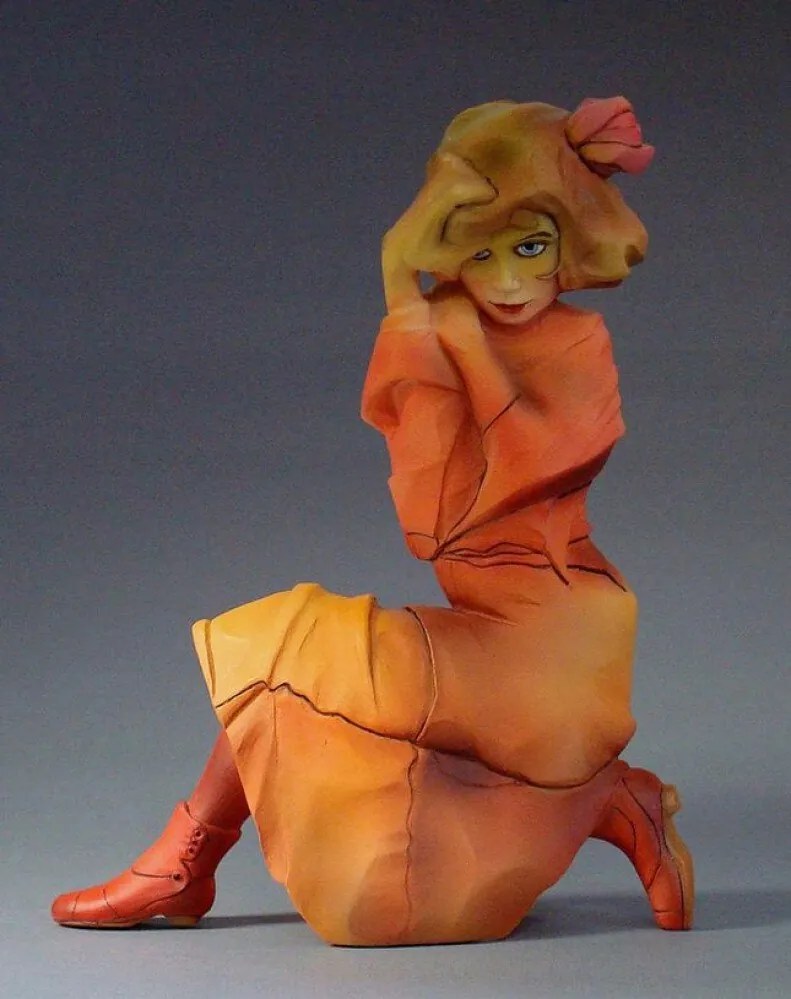 Parastone Figura Térdelő lány narancssárga ruhában Egon Schiele