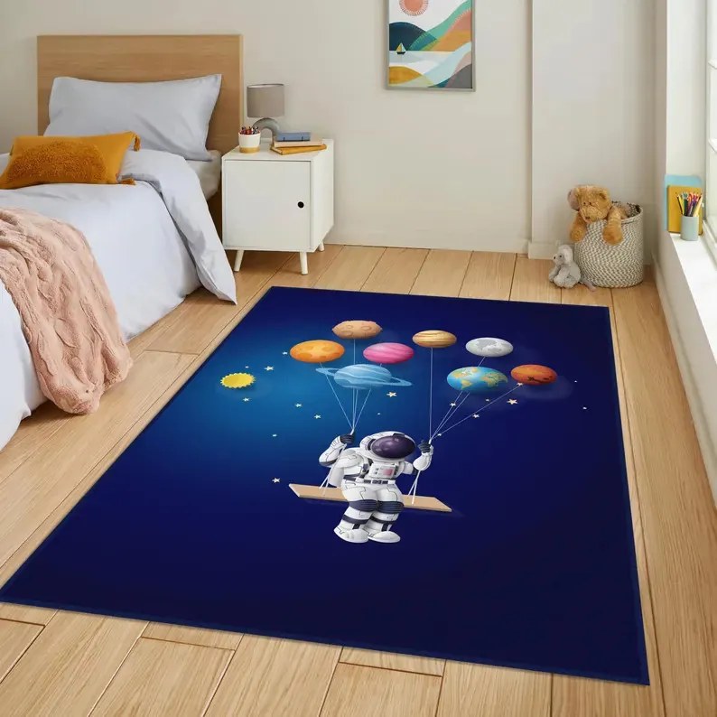 Űrhajós mintás gyerekszőnyeg 130x180 cm