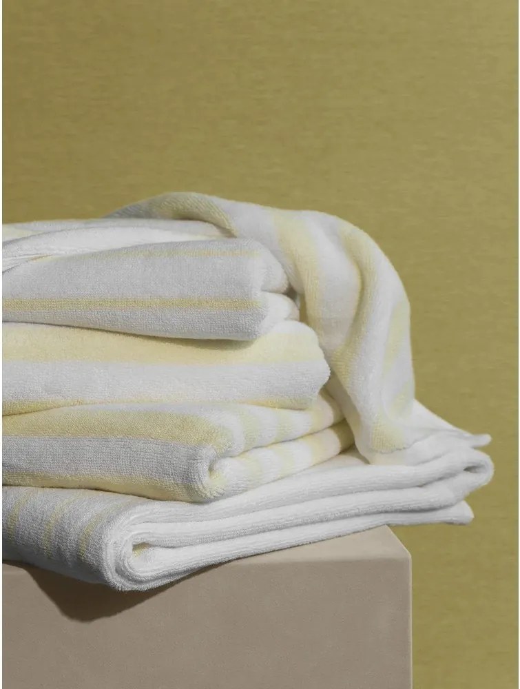 Világossárga-fehér frottír bio pamut fürdőlepedő 70x140 cm Arto – Blomus
