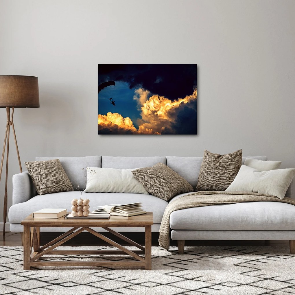 Ejtőernyős a felhőkben képe (70x50 cm)